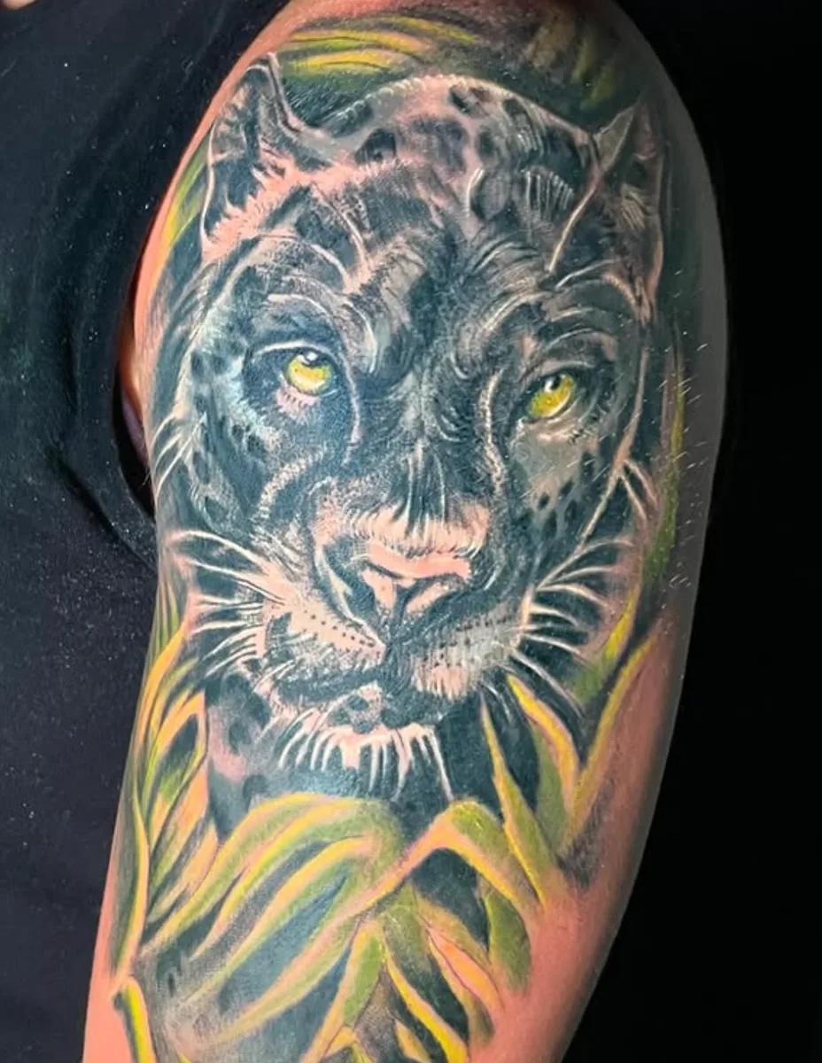 Color realism panther tattoo by Abby Christ at True North Tattoo in Lancaster, PA