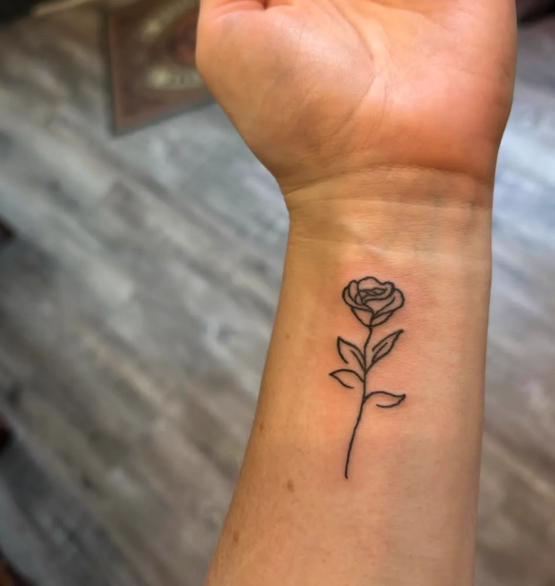 Fine line rose tattoo by Joel at True North Tattoo in Lancaster, PA