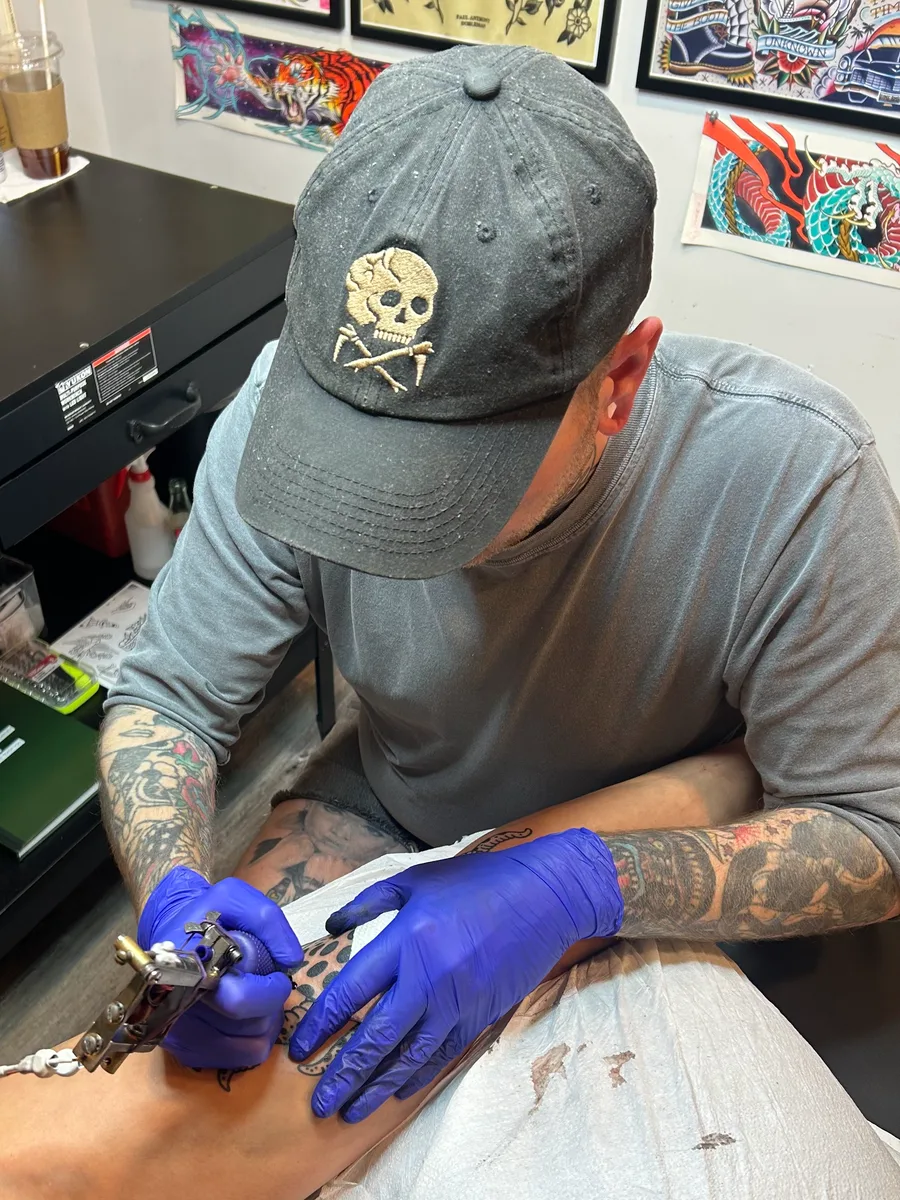 Josh Espenschied tattooing at True North Tattoo in Lancaster, PA