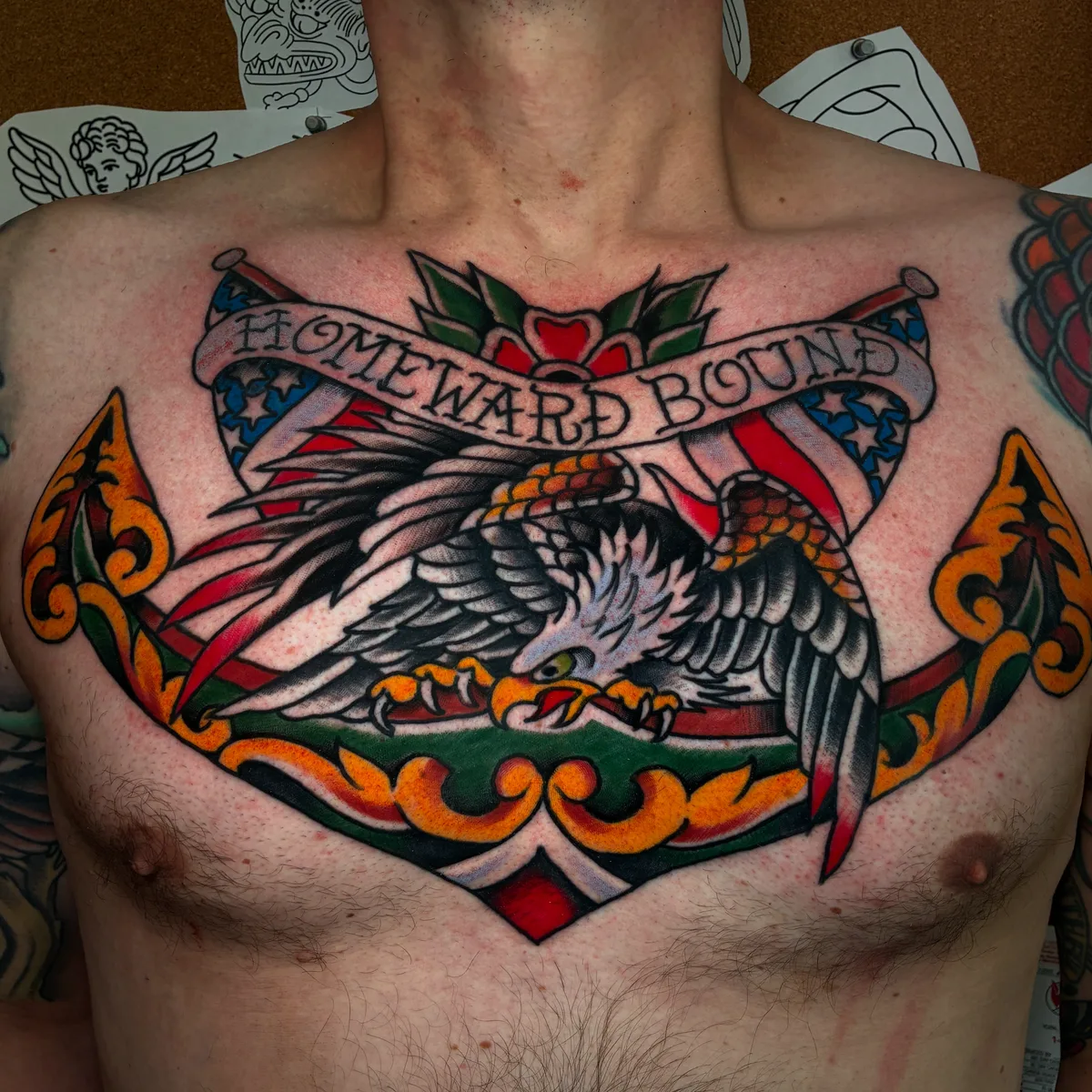 American traditional chest piece with an eagle, anchor and Homeward Bound banner by Reed Drury at True North Tattoo in Lancaster, PA